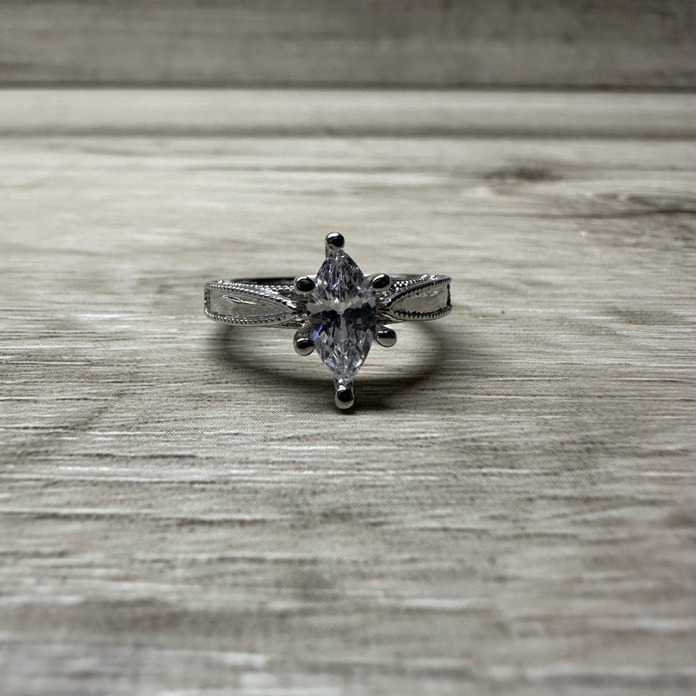 Stunning Silver Tone Marquise Cut Stone on a size 7 Ring